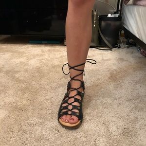 Lace up sandals by Adam Tucker for me too